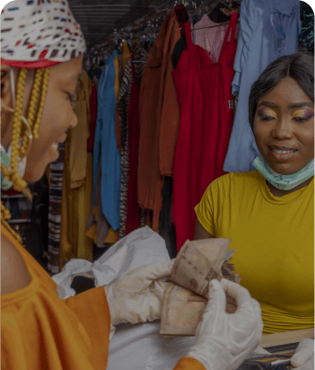 African market traders exchanging goods